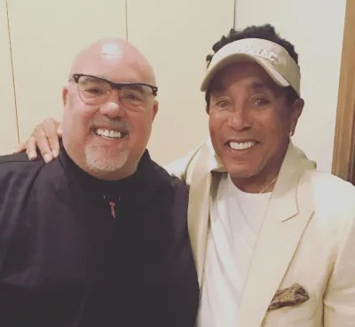 Smokey Robinson with his firstborn child, Berry William Borope Robinson.